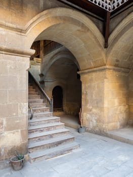 Exterior daylight shot of staircase going up leading to Caravansary - Wikala - of Bazaraa, suited in Gamalia district, Medieval Cairo, Egypt