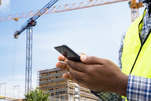 Builder Worker Using Phone. Construction Employee Communication