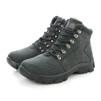 Trendy autumn or winter men's boots with insulation inside. Isolated on white background. Banner concept. Copy space.