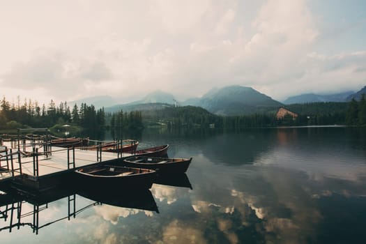 Mountain lake in National Park High Tatra. Overcast sky. Strbske pleso, Slovakia, Europe.
