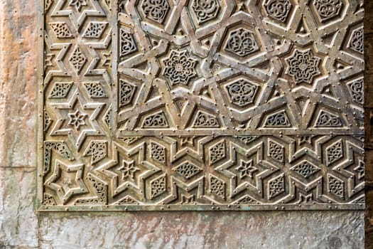 Ornaments of the bronze-plate ornate door of Sultan Qalawun mosque, an ancient historic mosque in Old Cairo, Egypt