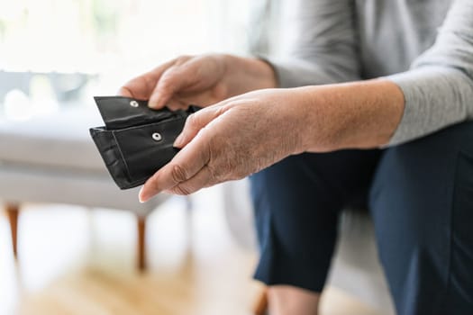 Desperate elderly woman unhappy with the rising cost of living