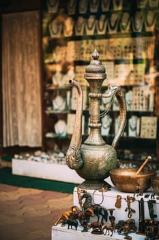 Goa, India. Oriental Copper Jug In Antique Shop.