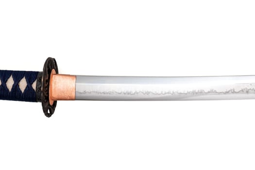 The habaki (collar) is made of polished copper. It is at the base of a Japanese sword blade with a wavy pattern on the sharp part. isolated on a white background. Selective focus.