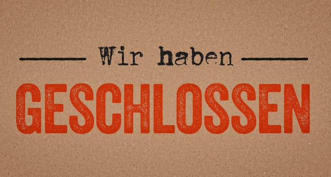 We are closed in german written on a retro paper background - Wir haben geschlossen