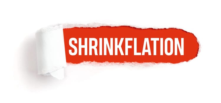 Hole in white paper with torns edges - Shrinkflation