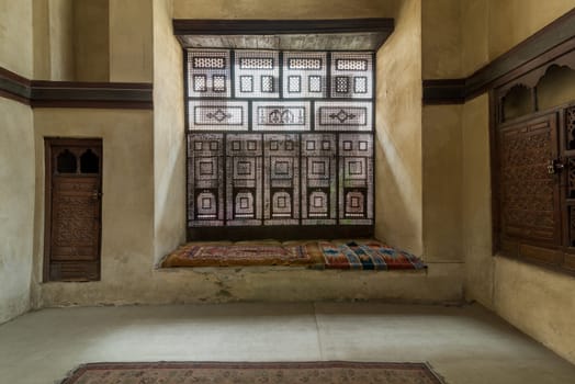 Hall at historic ottoman era El Sehemy house, with Interleaved wooden window - Mashrabiya, Moez Street, Medieval Cairo, Egypt