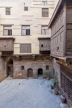 Facade of ottoman era historic house of Zeinab Khatoun with wooden oriel windows - Mashrabiya - located at Azhar district, Medieval Cairo, Egypt