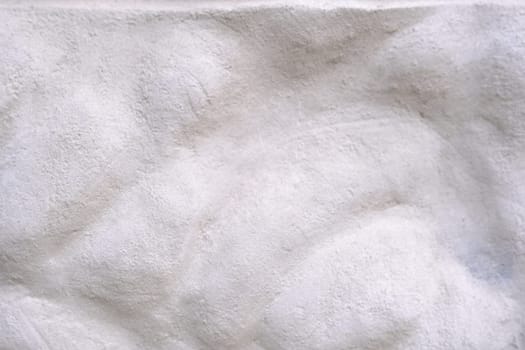 White Grunge Wall Background with rough texture.