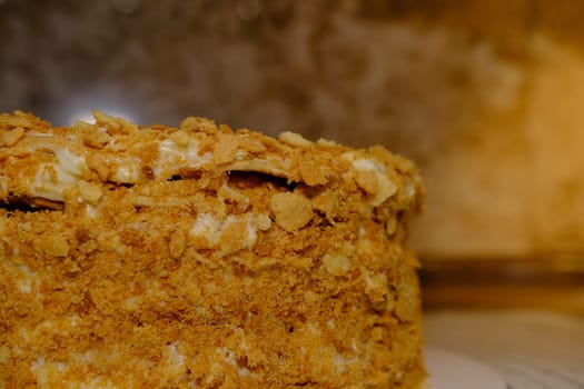 Board with delicious Napoleon cake, close up with selective blur.