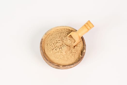 Healing earth powder in a bowl, supplement and antioxidant for to detox the body, alternative medicine