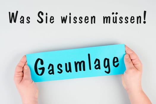 Gas commission is standing in german language on the paper, new fee regualtion in Germany, risk for impoverishment of the population, energy crisis