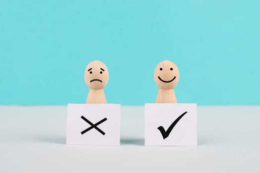Men holding signs with a check mark and a cross, business and education concept, happy and sad face, asking questions, looking for an answer, making a decision