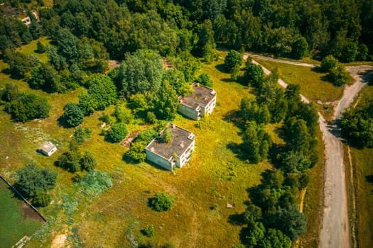 Belarus. Aerial View Of Abandoned Houses In Chernobyl Zone. Chornobyl Catastrophe Disasters. Dilapidated House In Belarusian Village. Whole Villages Must Be Disposed. Chernobyl Resettlement Zone.