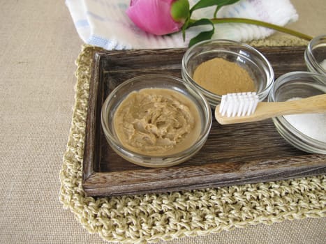 Homemade toothpaste recipe with coconut oil, xylitol and medicinal clay