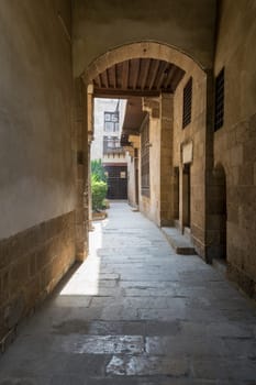 Stone bricks vaulted entrance of historic Beit El Sehemy house located in Moez street, Gamalia district, Cairo, Egypt