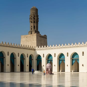 Cairo, Egypt- September 28 2012: Minaret of public historic Al Hakim Mosque known as The Enlightened Mosque, located in Moez Street, south of the old door of old Cairo gate named Bab Al-Futuh
