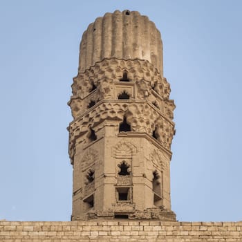 Minaret of public historic Al Hakim Mosque known as The Enlightened Mosque, located in Moez Street, Old Cairo, Egypt