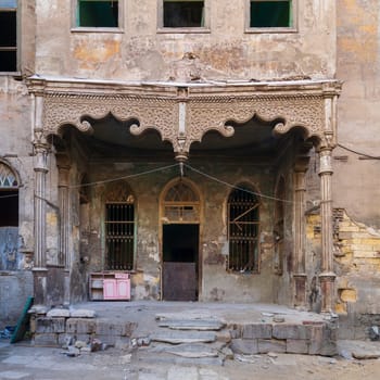 Facade of Bayt Madkour Pasha historic abandoned house located at Souq Al Selah Street, Darb Al Ahmar district, Old Cairo, Egypt