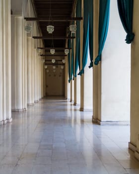 Corridor surrounding the courtyard of public historic Al Hakim Mosque known as The Enlightened Mosque, located in Moez Street, south of the old door of old Cairo gate named Bab Al-Futuh, Egypt