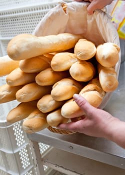 Baguette basket of bread loaves at bakery