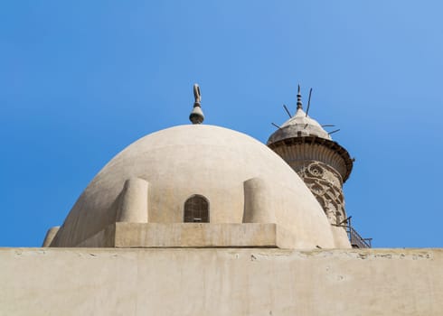 Dome at public historic mosque of Sultan Al Nassir Qalawun revealing minaret of Mamluk era El Zaher Barquq Mosque, Moez Street, Cairo, Egypt
