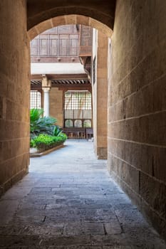 Stone bricks vaulted entrance of ottoman era historic Beit El Sehemy house located in Moez street, Gamalia district, Cairo, Egypt