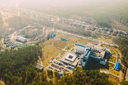 Gomel, Belarus. Aerial View OF Building Of Republican Scientific Center For Radiation Medicine And Human Ecology In Spring Sunny Day. Top View. Drone View. Bird's Eye View.