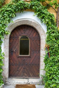 Old vintage wooden door in Hallstatt in Austria