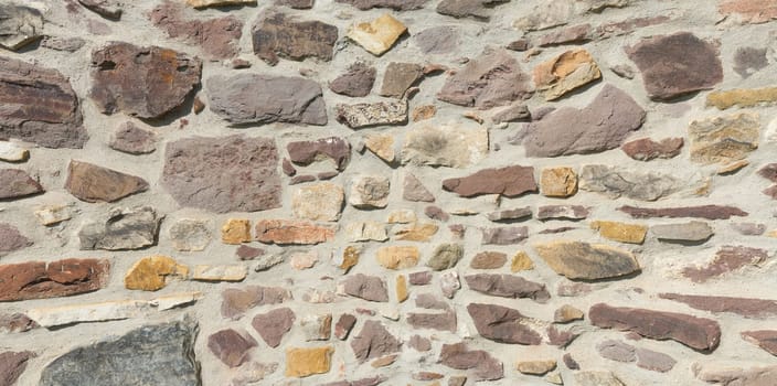 old Wall of natural stone on a historic building in Magdeburg in Germany