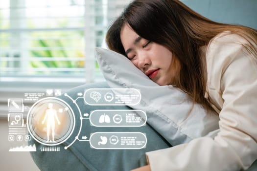 Tired woman sleeping closed eyes on sofa in living room at home after overworked working, Asian female resting falling asleep lying on couch, Close up face