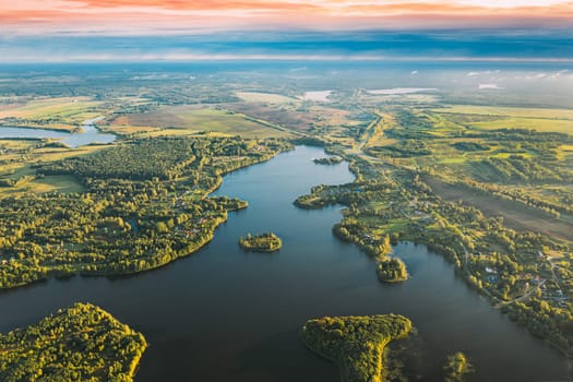 Lyepyel, Lepel Lake, Beloozerny District, Vitebsk Region. Aerial View Of Lyepyel Cityscape Skyline In Autumn Morning. Morning Fog Above Lepel Lake. Top View Of European Nature From High Attitude In Autumn. Bird's Eye View.