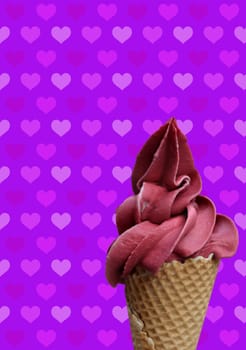 A waffle ice cream cone filled with a delicious freshly made raspberry soft serve ice cream.