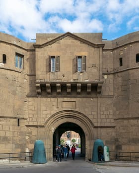 Cairo, Egypt- January 3 2016: Facade of National Military Museum with visitors departing, Citadel of Cairo, Salah El Din Al Ayouby Citadel