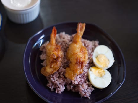 Deep-fried breaded shrimp or  fried prawn balls with boil egg  .  THAI FOOD
