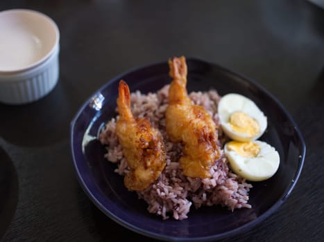 Deep-fried breaded shrimp or  fried prawn balls with boil egg  .  THAI FOOD