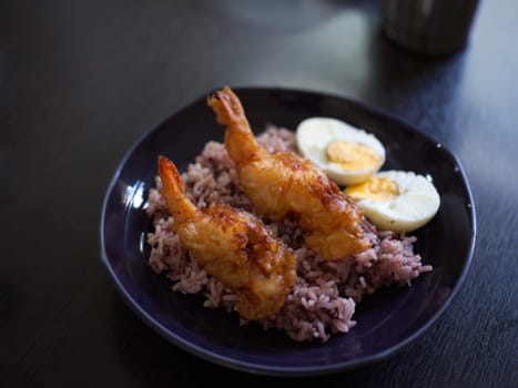 Deep-fried breaded shrimp or  fried prawn balls with boil egg  .  THAI FOOD