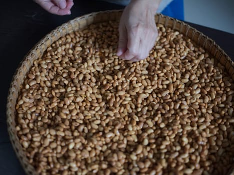 Close-up photo the texture of soy bean for HOW to Soy Product: Raw Homemade Tempeh . Concept of Healthy Vegetarian Food