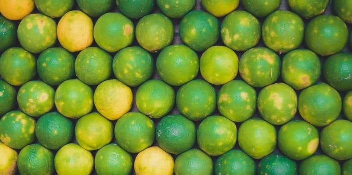 Full Frame Photo Of Fresh Green Mausami, sweet lemon For Sale In The Market, Fruit backgrounds