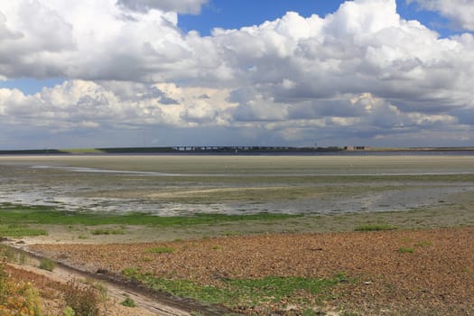 Wadden Sea during the low tide, lower water at the North Sea coast in summer.Watt bei der Ebbe, Niedrigwasser an der Nordseeküste im Sommer.