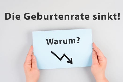 The birth rate is falling, why is standing in german language on the paper, collapse of the population, social issue