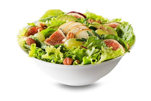 Fresh green leafy salad with fruits and nuts isolated on white background. Concept for a tasty and healthy meal