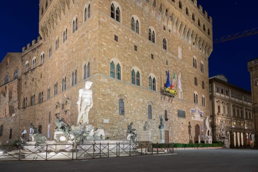 Florence, Italy - Circa June 2021:  architecture illuminated by night, Piazza della Signoria - Signoria Square. Urban scene in exterior - nobody.