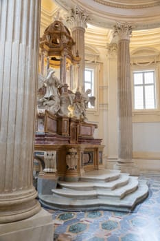VENARIA REALE, ITALY - Circa January 2022: Baroque catholic church altar. Old interior religious building.