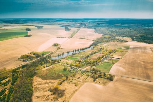 Vasilyovka, Dobrush District, Gomel Region, Belarus. Aerial View Of Small Village With Wooden Houses At Spring Day. Beautiful Rural Landscape In Bird's-eye View.