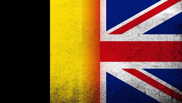 National flag of United Kingdom (Great Britain) Union Jack with Kingdom of Belgium National flag. Grunge background
