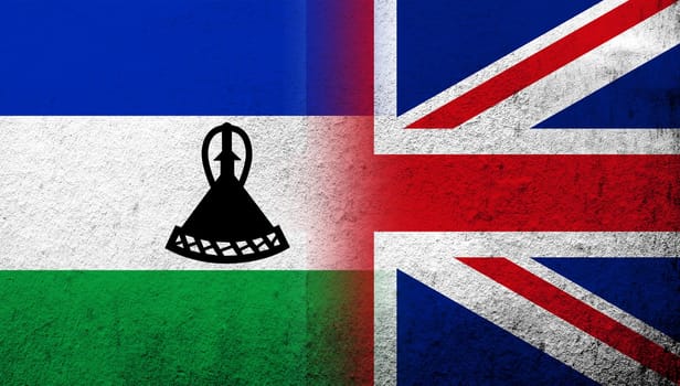 National flag of United Kingdom (Great Britain) Union Jack with Lesotho National flag. Grunge background