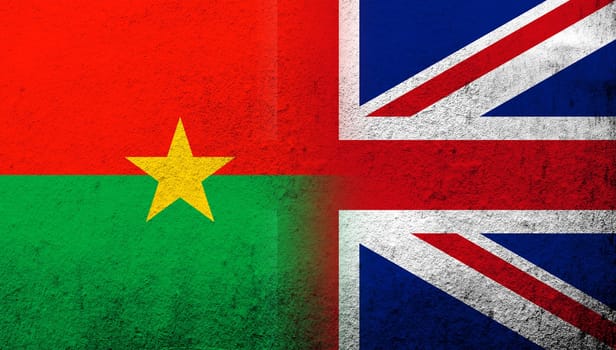 National flag of United Kingdom (Great Britain) Union Jack with National flag of Burkina Faso. Grunge background
