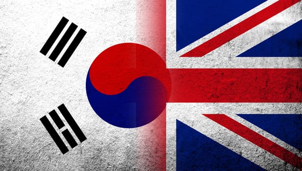 National flag of United Kingdom (Great Britain) Union Jack with National flag of South Korea. Grunge background