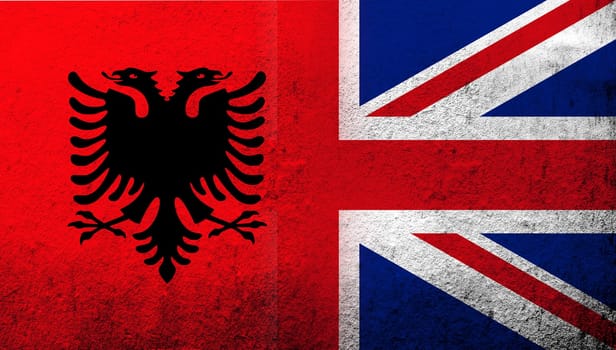 National flag of United Kingdom (Great Britain) Union Jack with Republic of Albania National flag. Grunge background